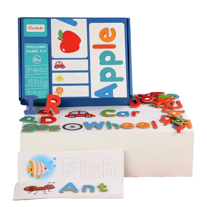Spelling game with cards spelling fish, ant, car and wheel beside a pile of letters