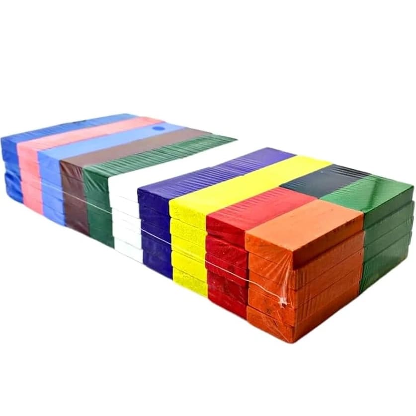 Colored wooden domino tiles stacked in shrink wrap