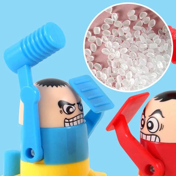 Close-up of the blue and red hammer figures with a pellet material inset